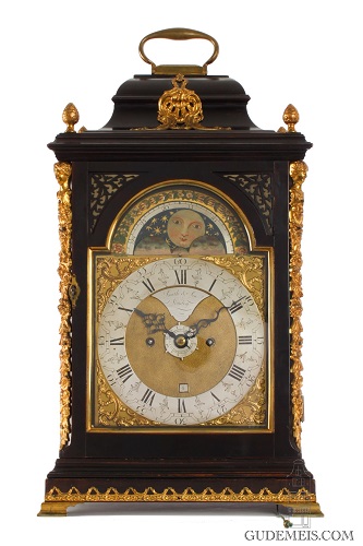 An English ebonized table clock for the Dutch market with moonphase, Smith & Son London, circa 1770.